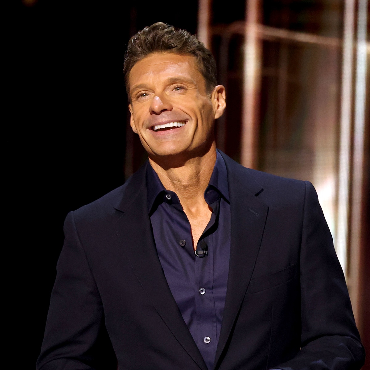 Ryan Seacrest Makes Dinner for Two a Muscle Showcase