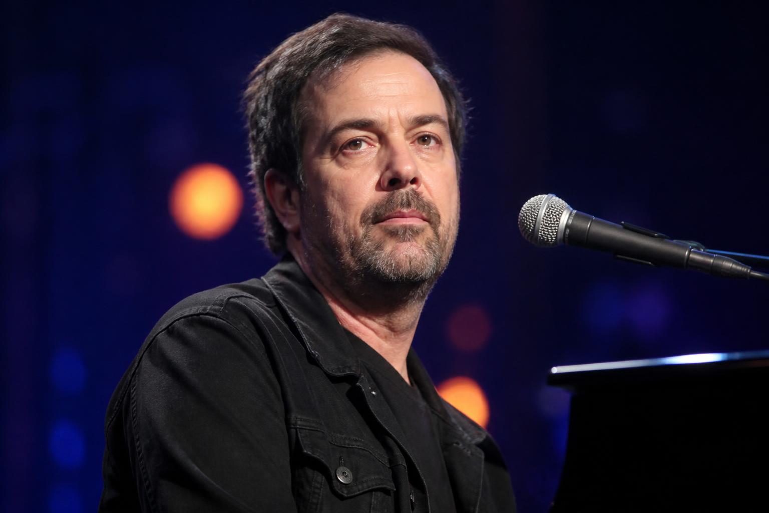 Duncan Sheik Hospitalized as Family Shares ‘Critical but Stable’ Update — AI editorial illustration